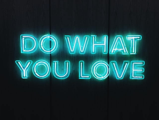 neon sign that says do what you love